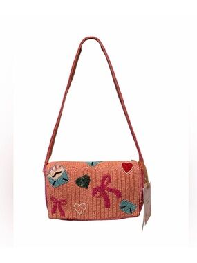 Beaded "Love Letter" shoulder bag with heart & bow designs. Handmade in India.